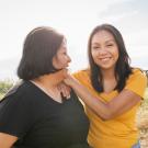 Teen girl smiling with mother