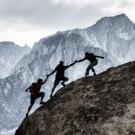 People climbing up a mountain