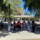 Group of six people on UC Davis campus