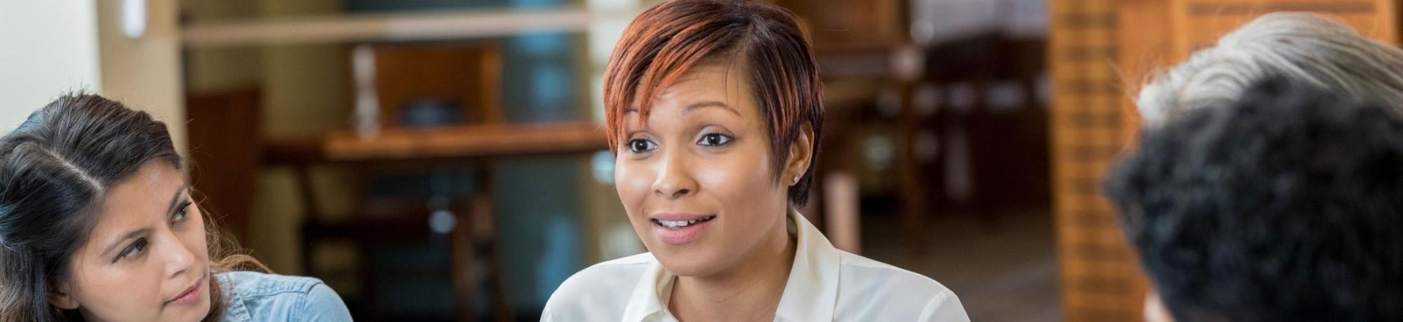 woman talking to a group